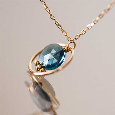 delicate london blue topaz necklace 18k recycled gold 