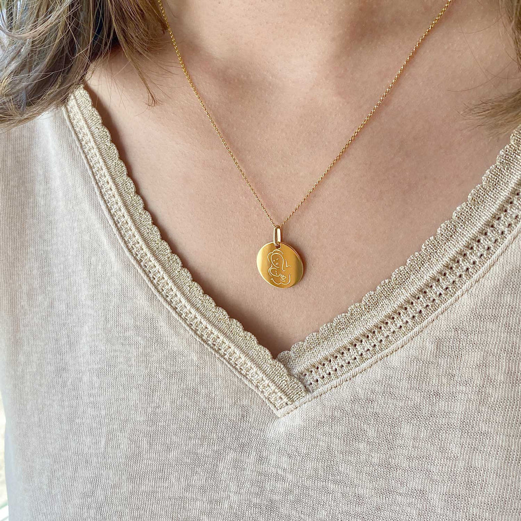 Muze 18k gold Vermeil Child Medal necklace, art inspired jewelry symbol of love, protection, tenderness and motherhood. A meaningful sentimental gift perfect for mother, newly born or godchild