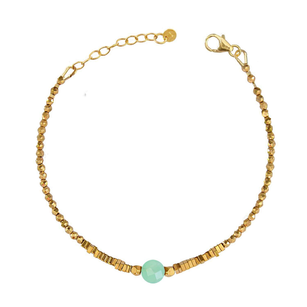 Elegant Hematite Beaded bracelet with a central faceted chrysoprease gemstone on a white background. Perle de Lune jewelry