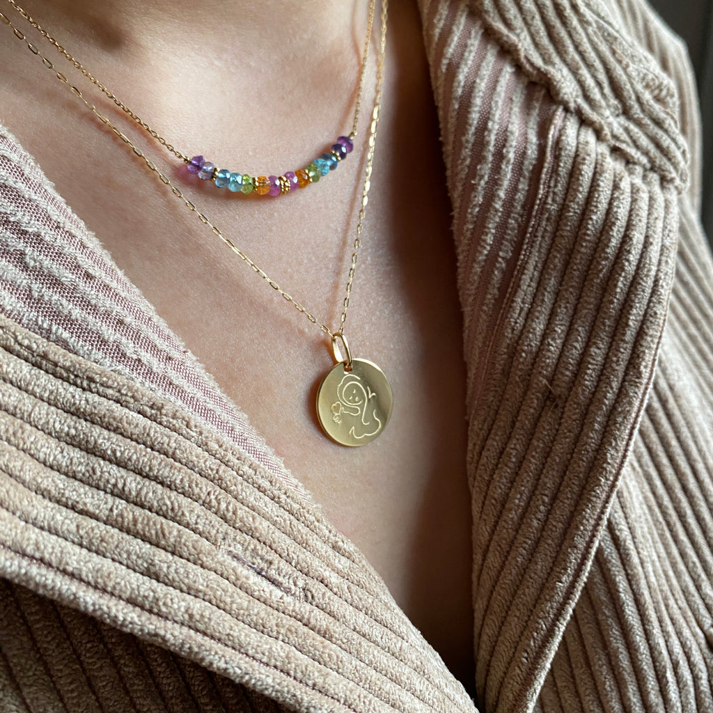 Muze 18k gold Vermeil Child Medal necklace on odel with rainbow necklace art inspired jewelry symbol of love, protection, tenderness and motherhood. A meaningful sentimental gift perfect for mother, newly born or godchild