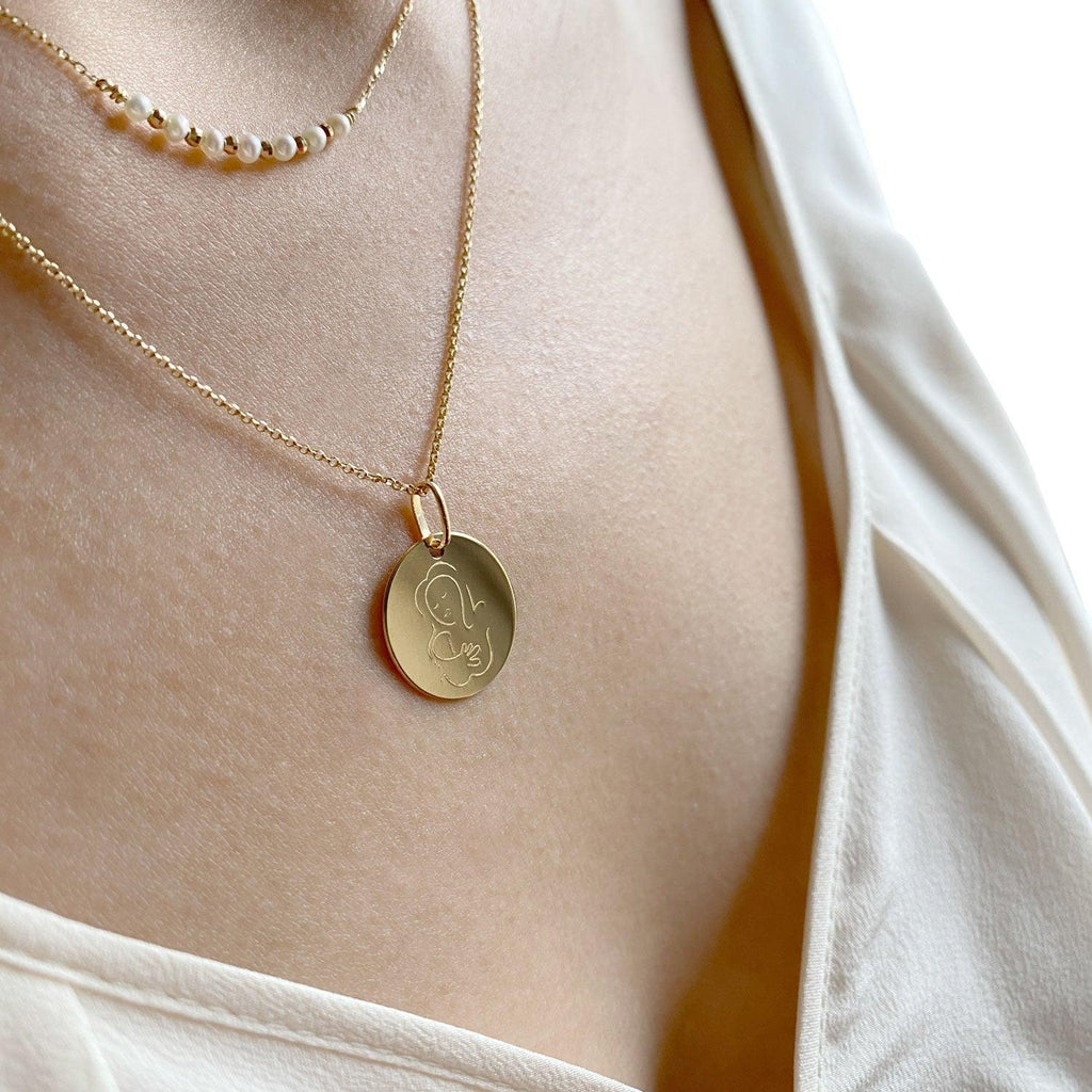 Muze 18k gold Vermeil Child Medal necklace, art inspired jewelry symbol of love, protection, tenderness and motherhood. A meaningful sentimental gift perfect for mother, newly born or godchild