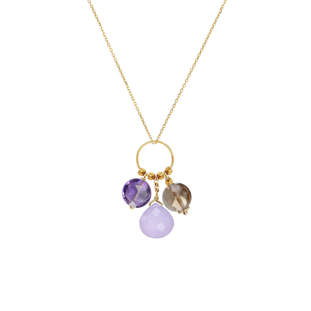 A chain with  trio of gemstone charms hanging from a ring in 18k gold  with  Amethyst, Lavender Jade & Smoky Quartz